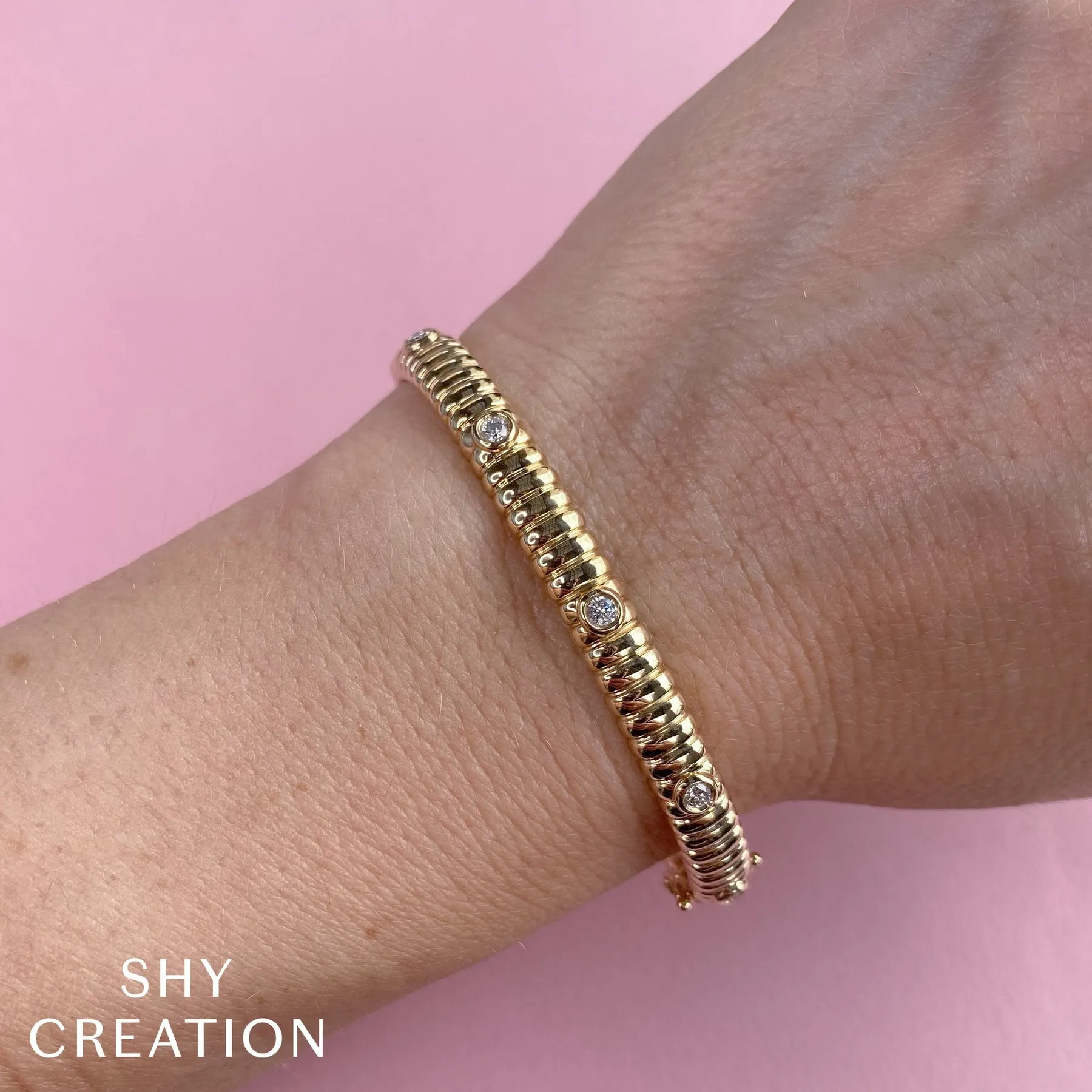 0.33CT DIAMOND BEZEL BANGLE SC55026033ZS