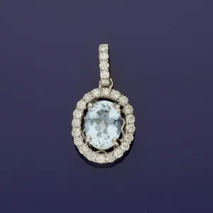 18ct White Gold Aquamarine and Diamond Halo Oval Pendant