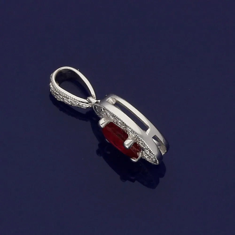 18ct White Gold Ruby & Diamond Oval Halo Pendant