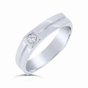Alliance en or blanc sertie d'un diamant.