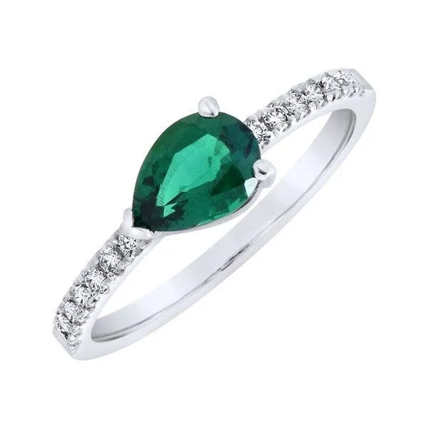 Bague en or blanc sertie de diamants et d'une meraude de synthse