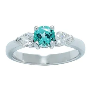 Bague en or blanc sertie d'un chrysoberyl de synthse et de diamants.