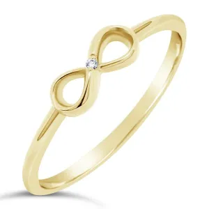 Bague infinity en or jaune serti d'un diamant.