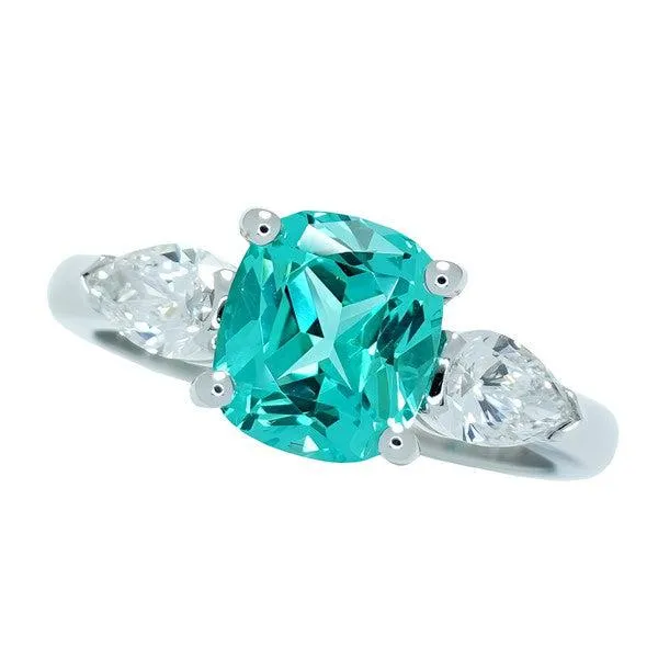 Bague or blanc sertie d'un chrysobryl de synthese et de diamants taille poire certifis.