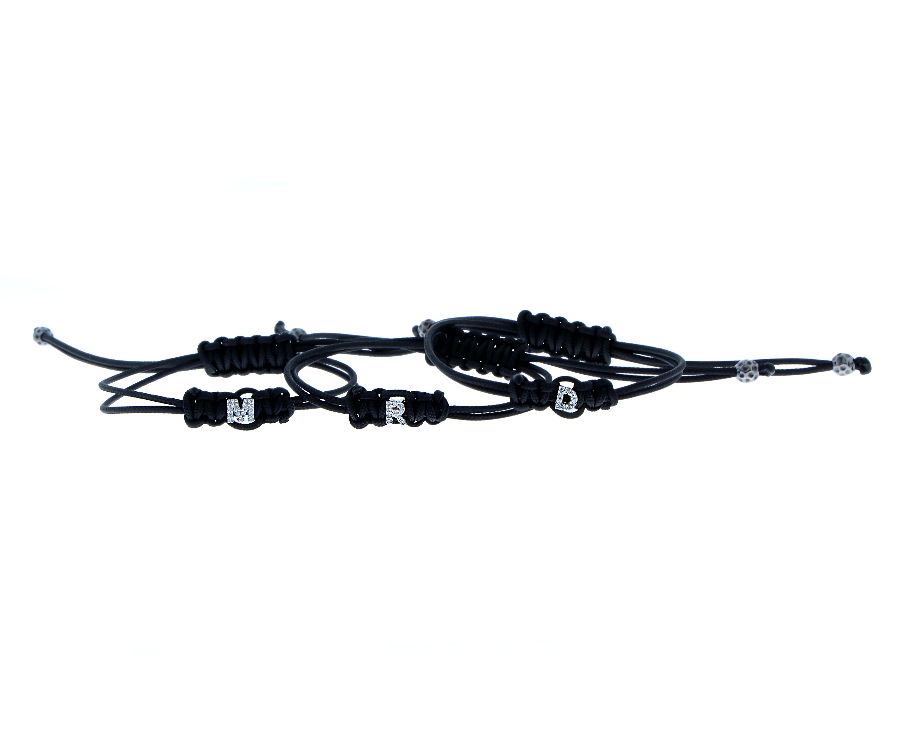Black rope bracelet with a diamond letter