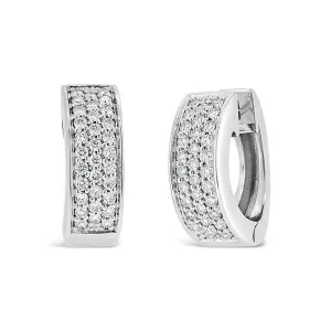 Boucle d'oreilles en or blanc sertie de diamants.