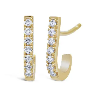Boucle d'oreilles en or jaune sertie de diamants.
