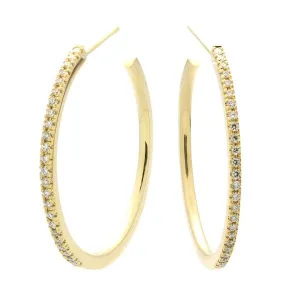 Boucle d'oreilles en or jaune serties de diamants.