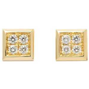 Boucles d'oreille en jaune serties de diamants.