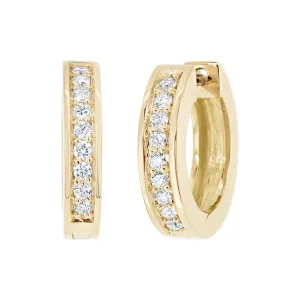 Boucles d'oreille en or jaune serties de diamants.