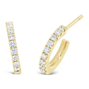 Boucles d'oreilles en or jaune serties de diamants.
