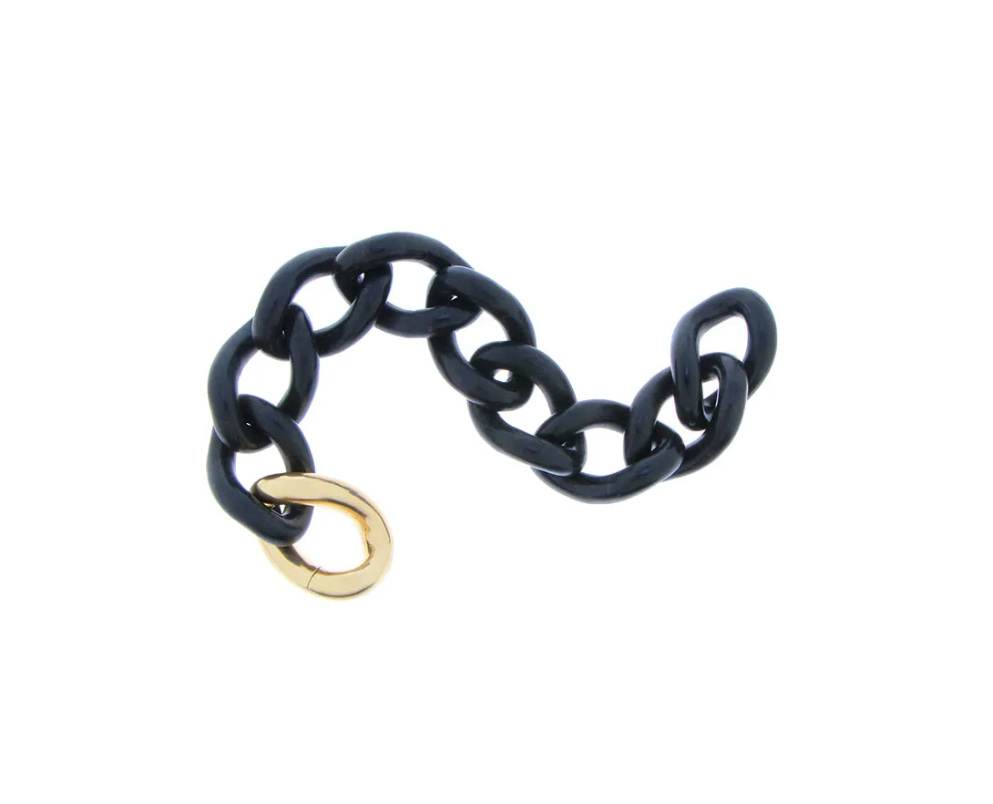 Ebony gourmet chain bracelet with a single yellow gold link closure