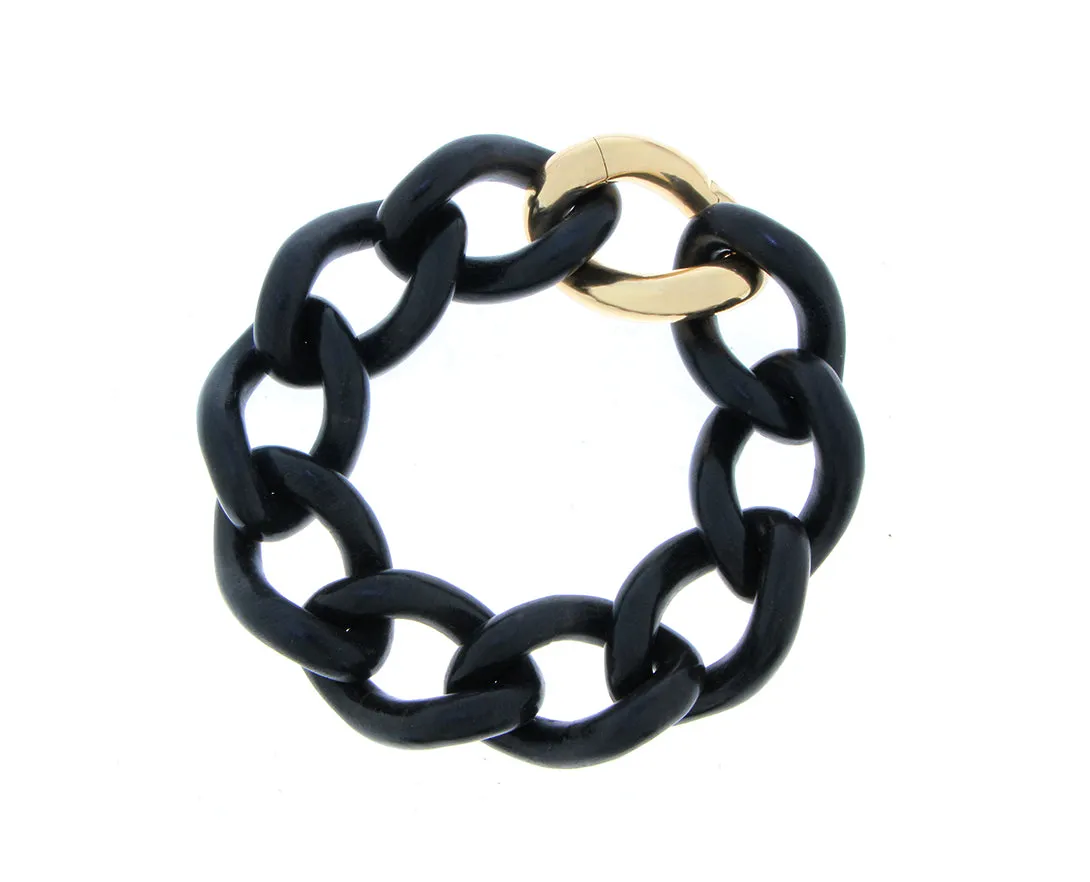 Ebony gourmet chain bracelet with a single yellow gold link closure