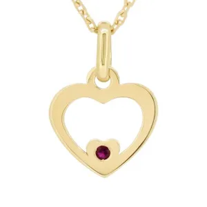 Pendentif Coeur en or jaune serti d'un rubis.