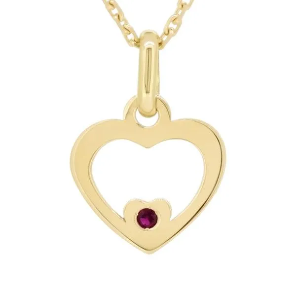 Pendentif Coeur en or jaune serti d'un rubis.