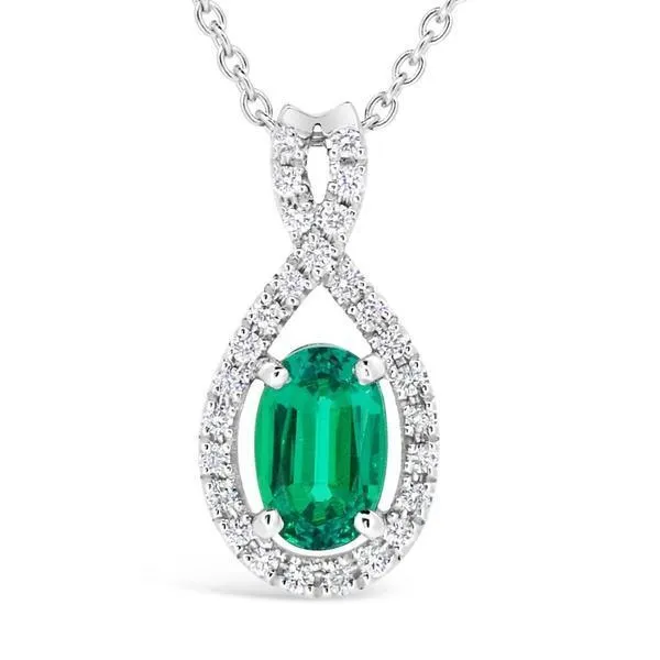 Pendentif en or blanc serti de diamants et d'une meraude de synthse.