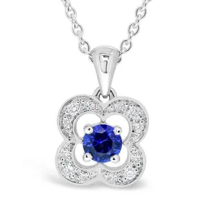 Pendentif en or blanc serti d'un saphir et de diamants.