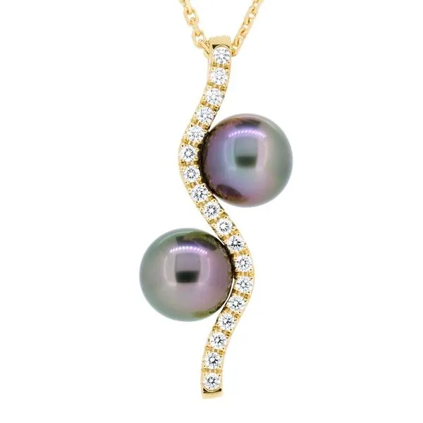 Pendentif en or jaune serti de diamants et 2 perles de Tahiti.