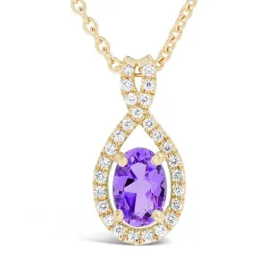 Pendentif en or jaune serti d'une Amthyste et de diamants.