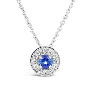 Pendentif entourage en or blanc serti d'un saphir et de diamants