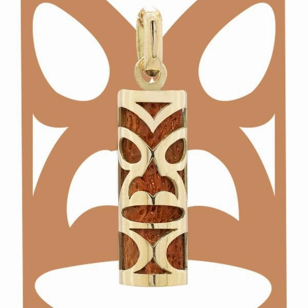 Pendentif tiki chambranle en or jaune. corail rouge du lagon
