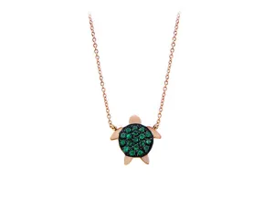Pink gold necklace with turtle set with tsavorites