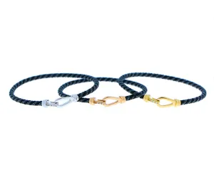 Rope bracelet with a gold and diamond closure