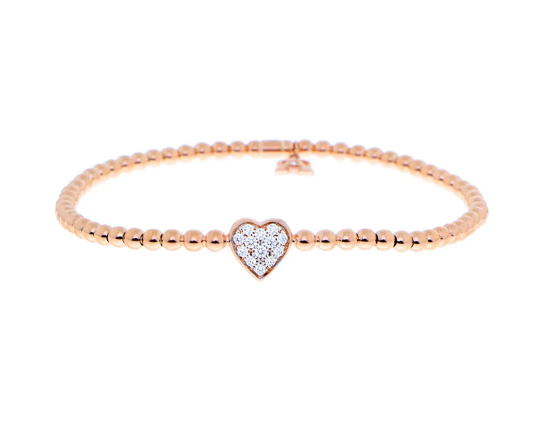 Rose gold ball bracelet with a diamond heart charm