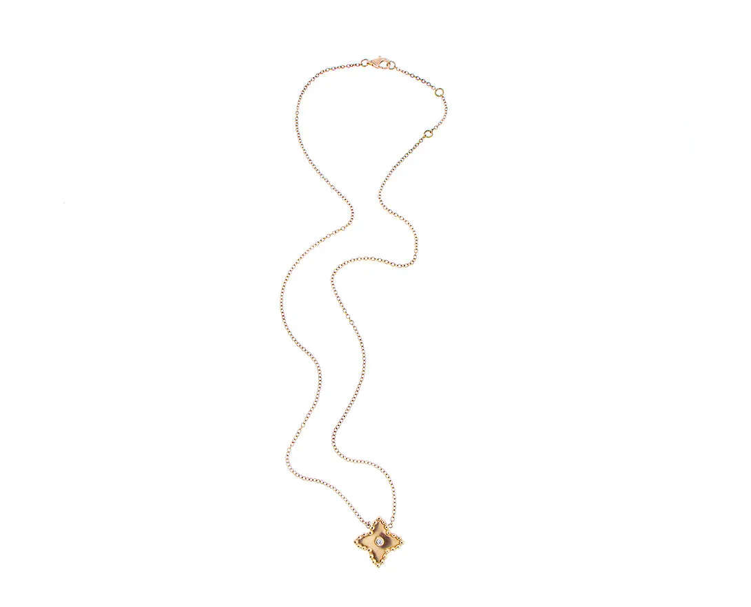Rose gold star necklace with a diamond