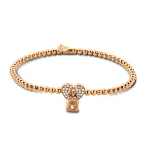Rose gold stretch bracelet with heart and lock