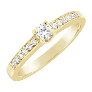 Solitaire en or jaune serti de diamants.