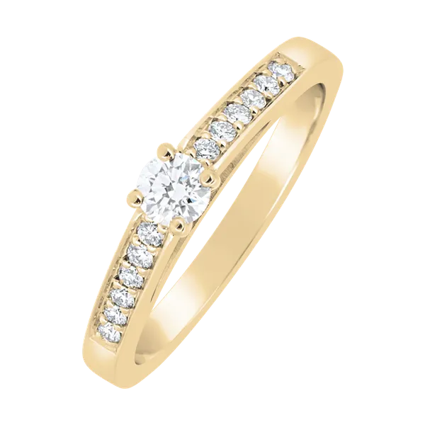 Solitaire en or jaune serti de diamants.