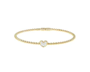 Yellow gold ball bracelet with a diamond heart