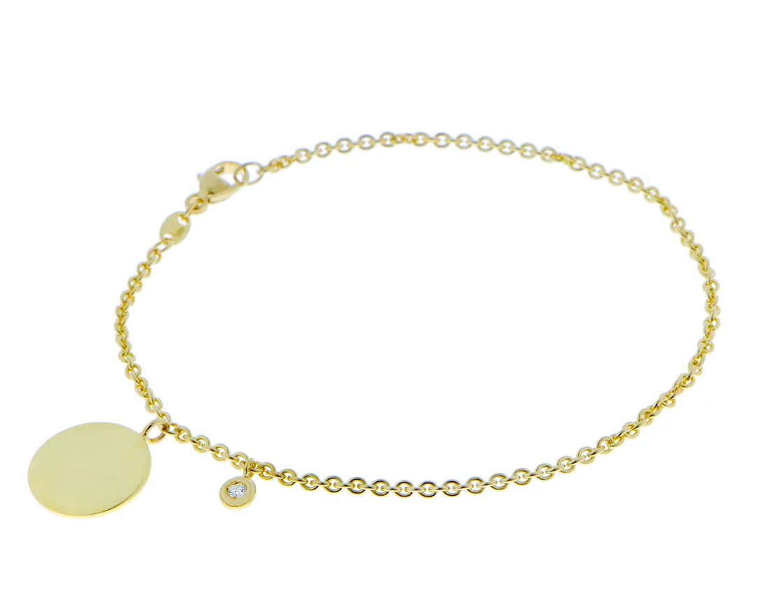 Yellow gold bracelet with a coin and diamond pendant