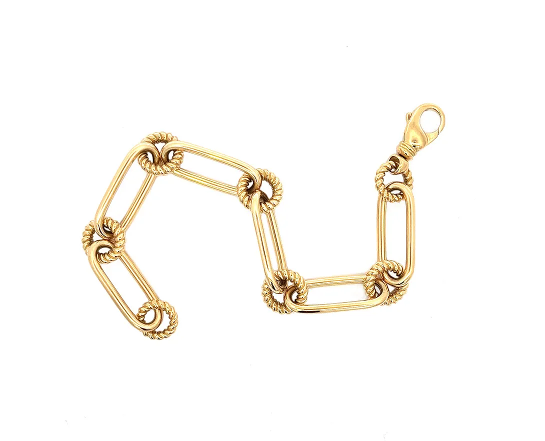 Yellow gold bracelet with round twisted and long oval smooth chains