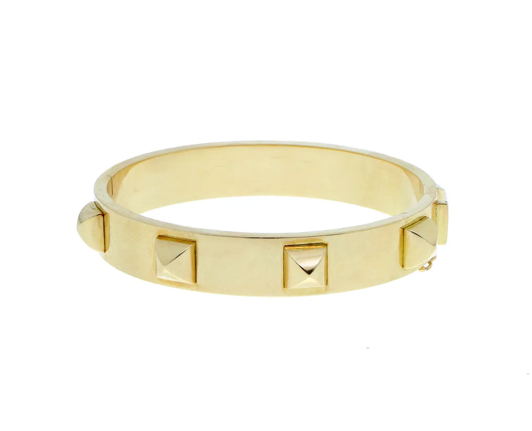 Yellow gold bracelet with studs