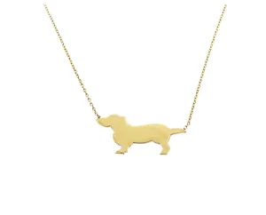 Yellow gold necklace with a dog pendant