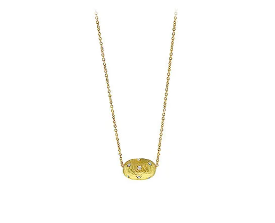 Yellow gold necklace with a nugget set with diamonds