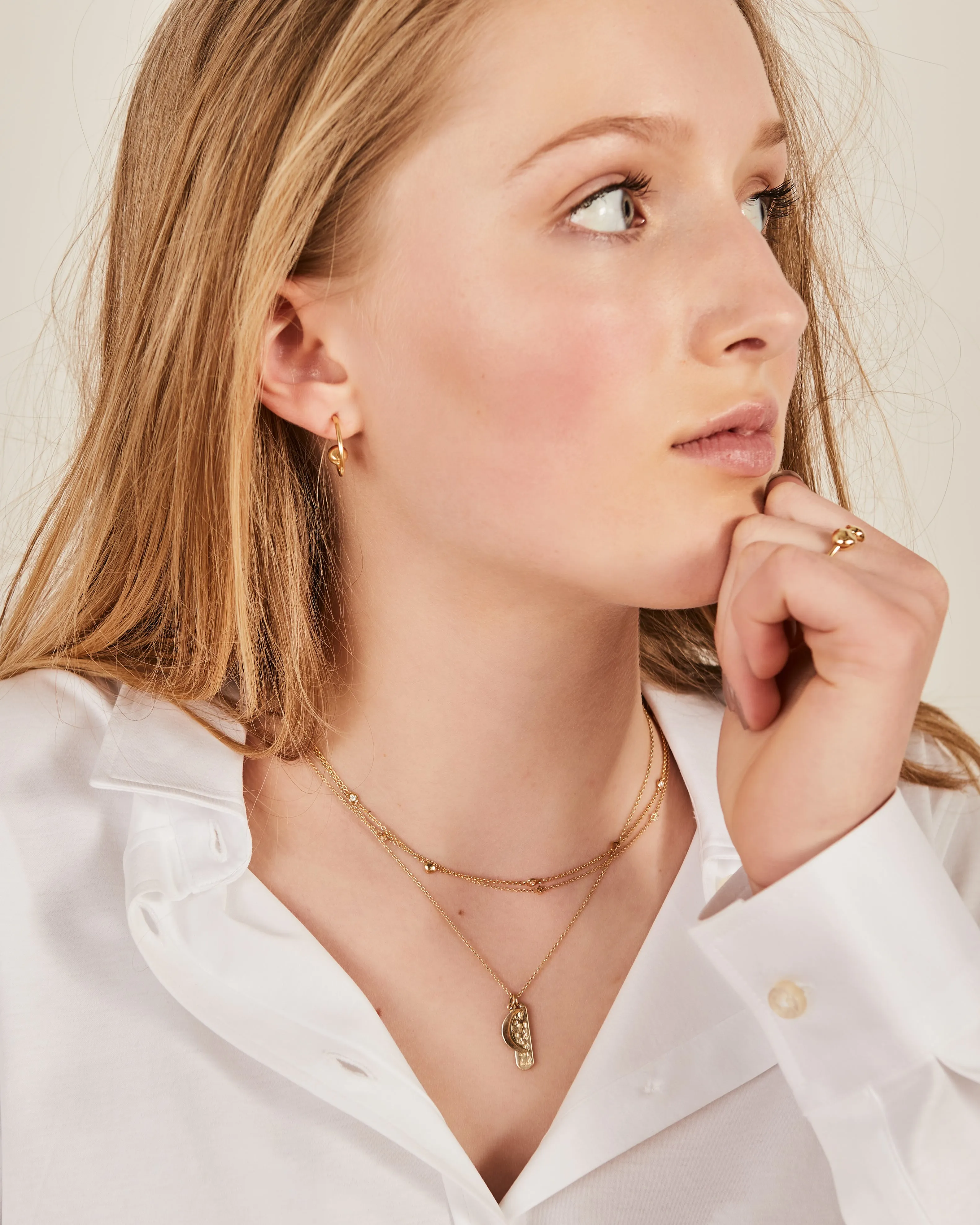 Yellow gold necklace with a "I love U to the moon and back" pendant