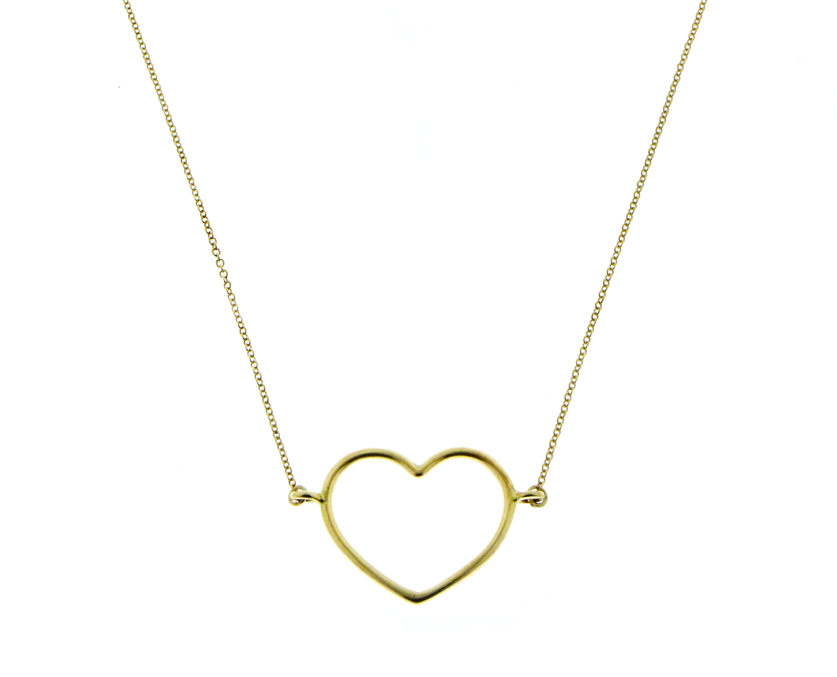 Yellow gold necklace with an open heart pendant