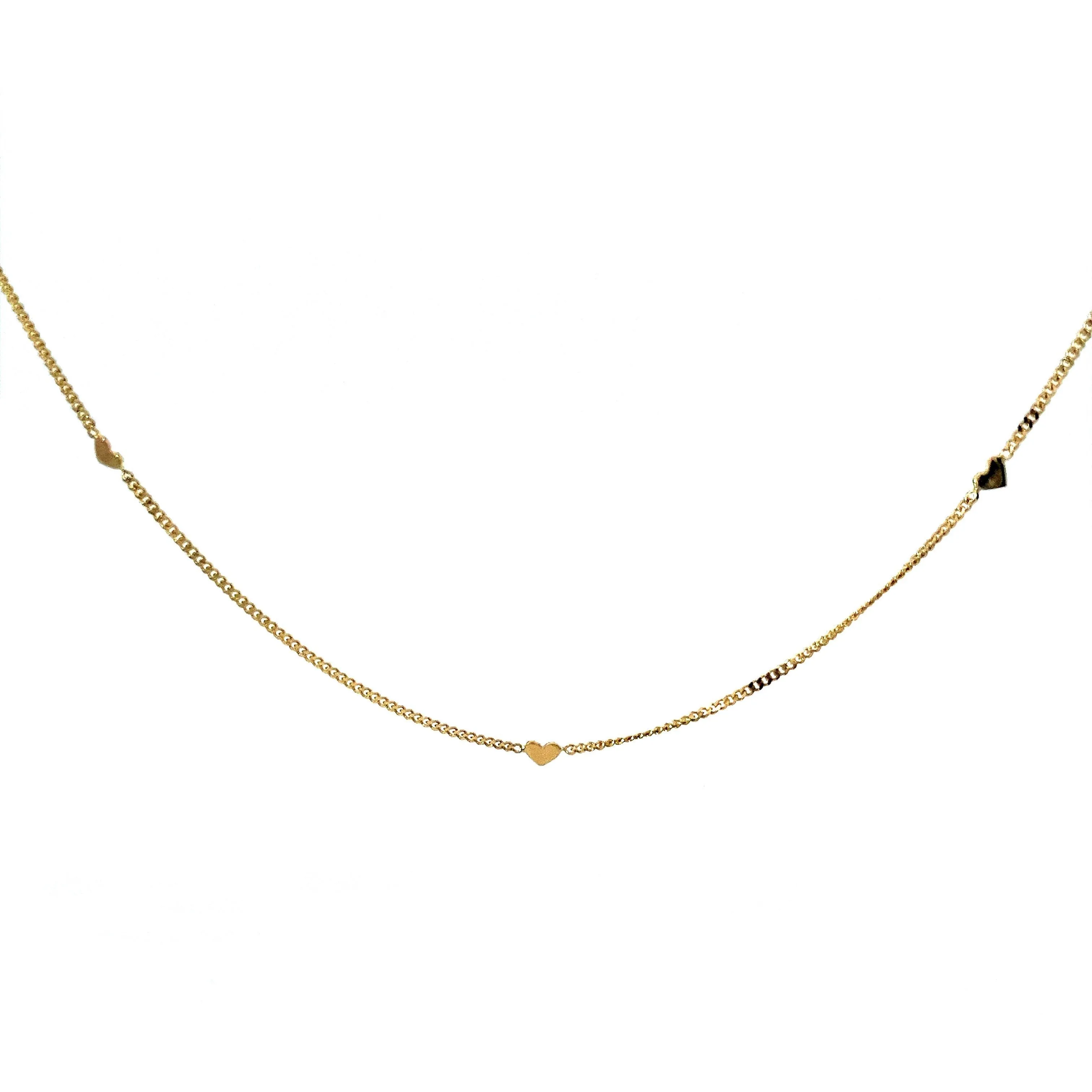 Yellow gold necklace with charms
