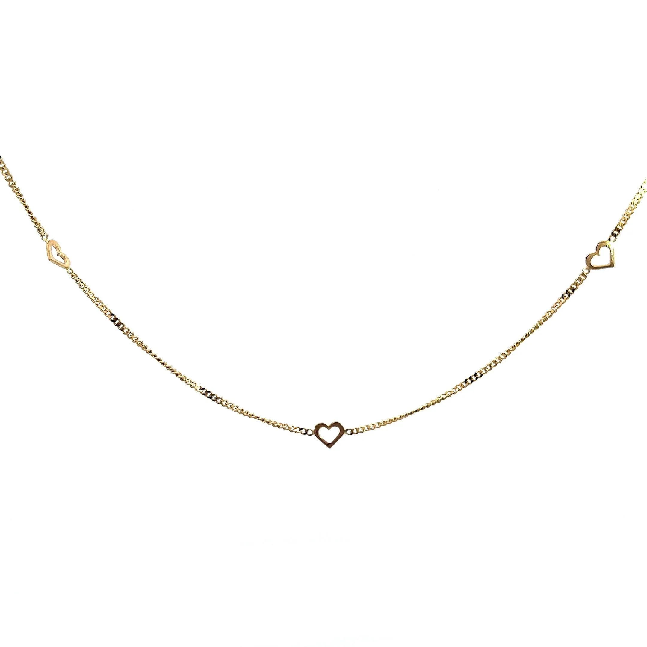 Yellow gold necklace with charms