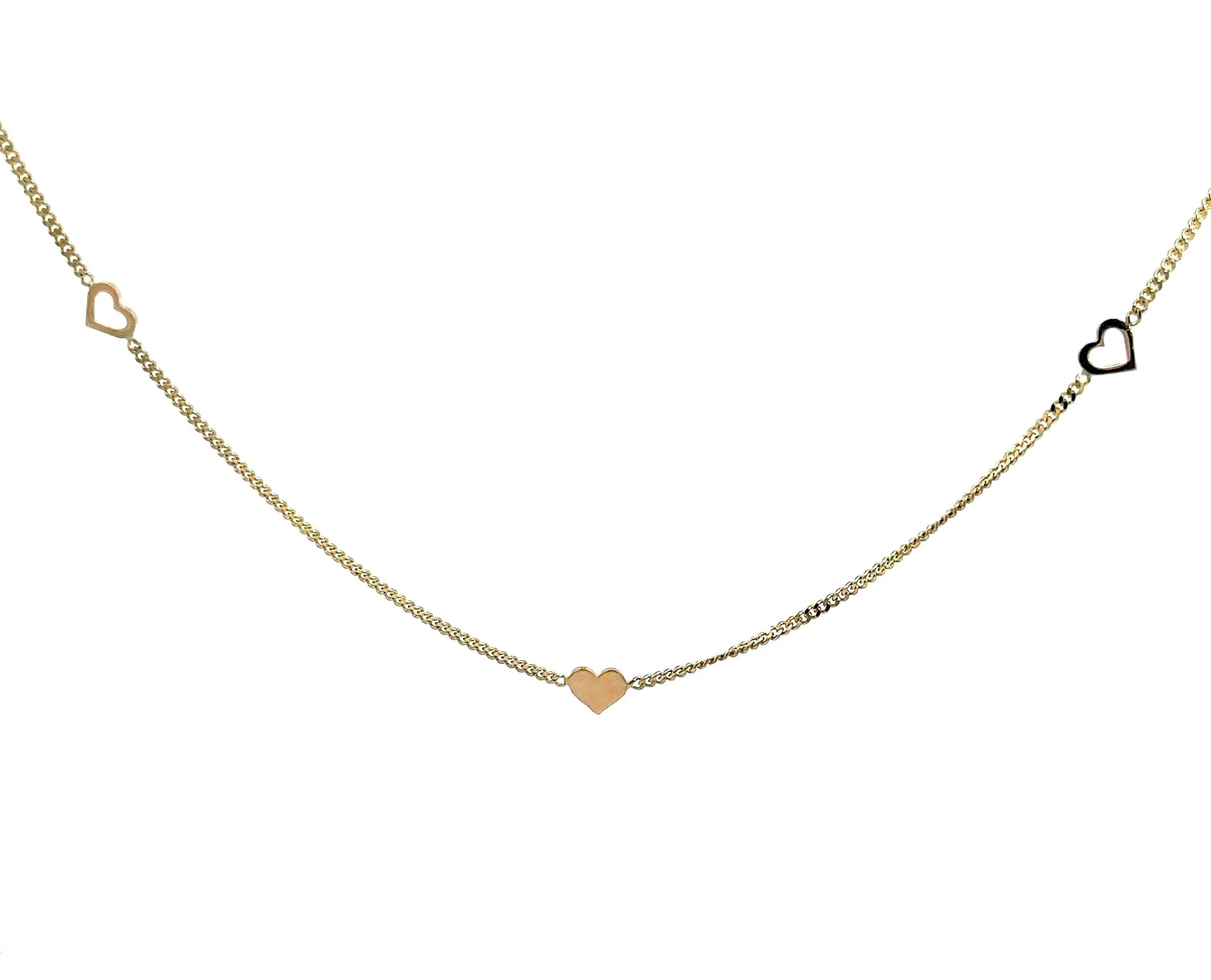 Yellow gold necklace with charms