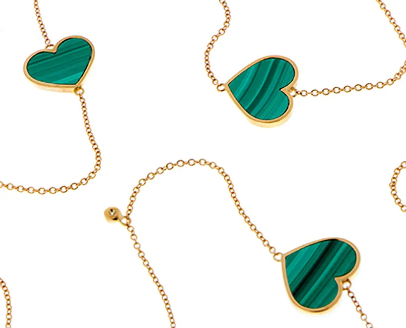 Yellow gold necklace with diamonds and malachite hearts