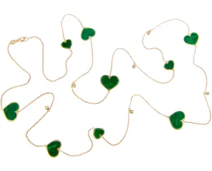 Yellow gold necklace with diamonds and malachite hearts