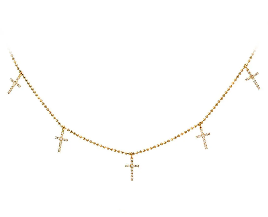 Yellow gold necklace with five small diamond cross charms