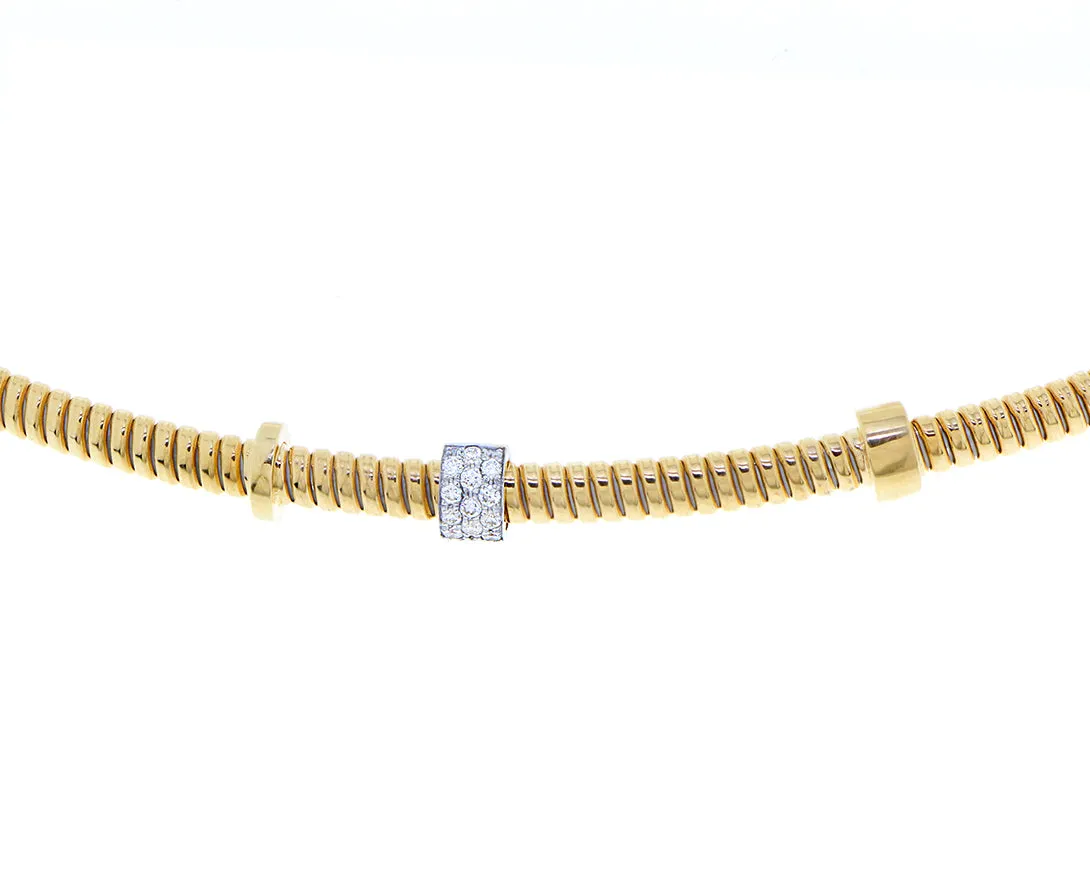 Yellow gold tubo necklace with flexible diamond element