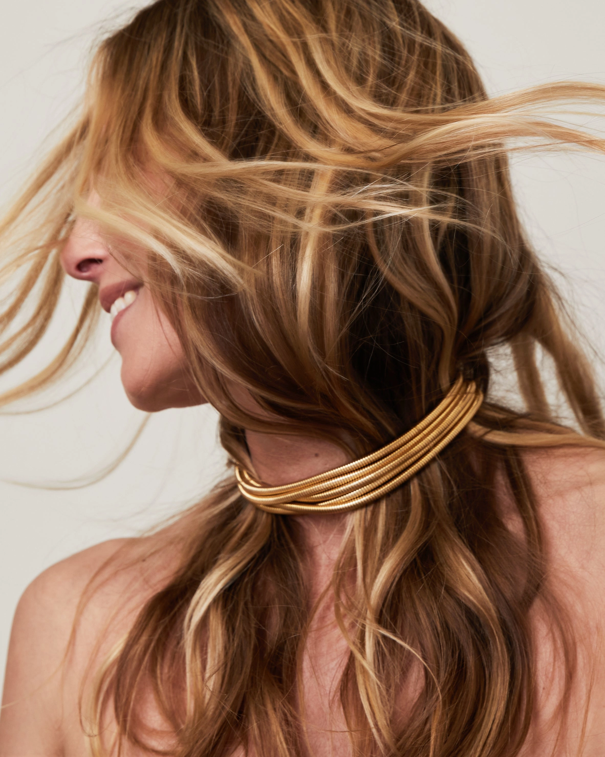 Yellow gold 5 row tubo necklace
