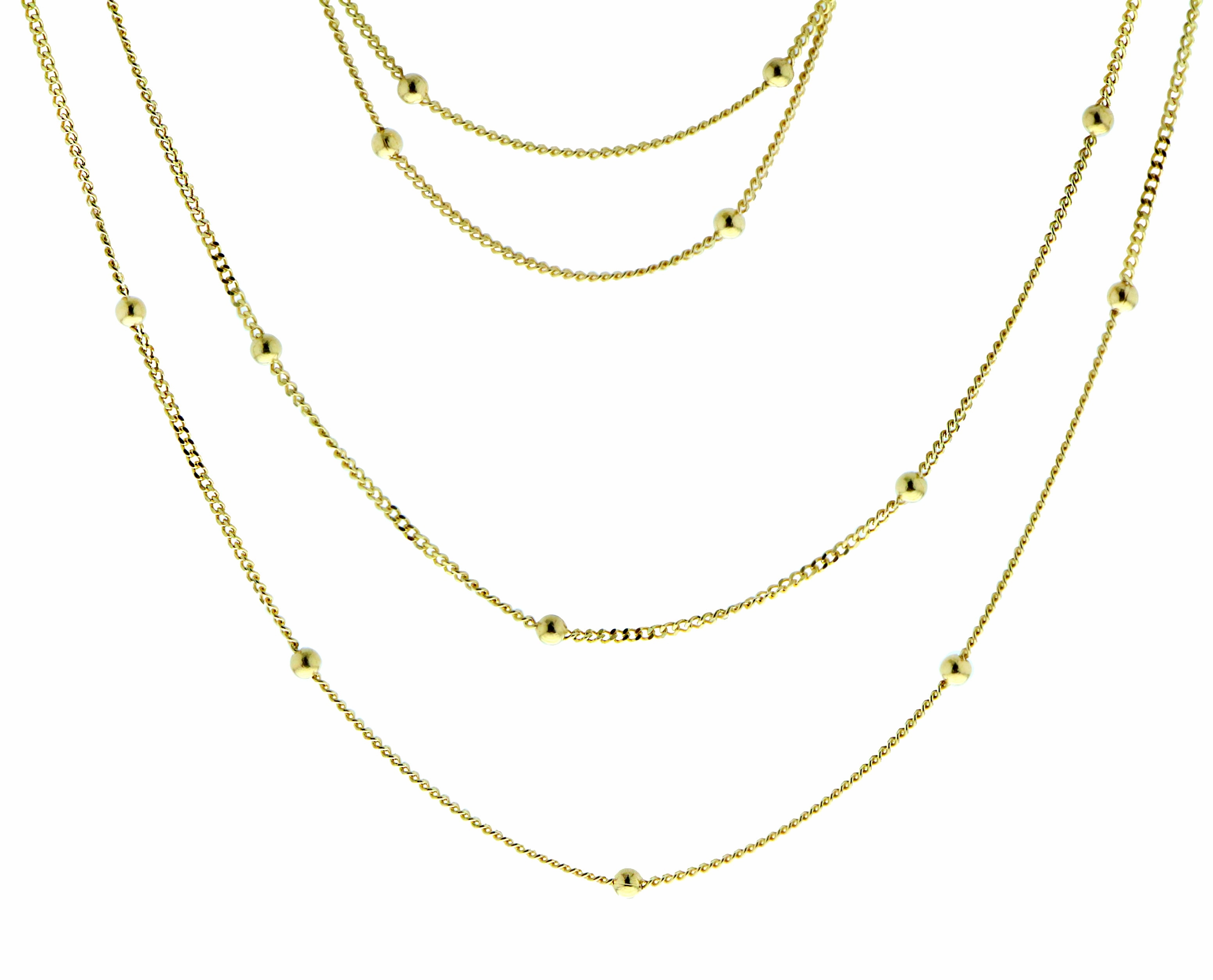 Yellow gold double necklace with small balls