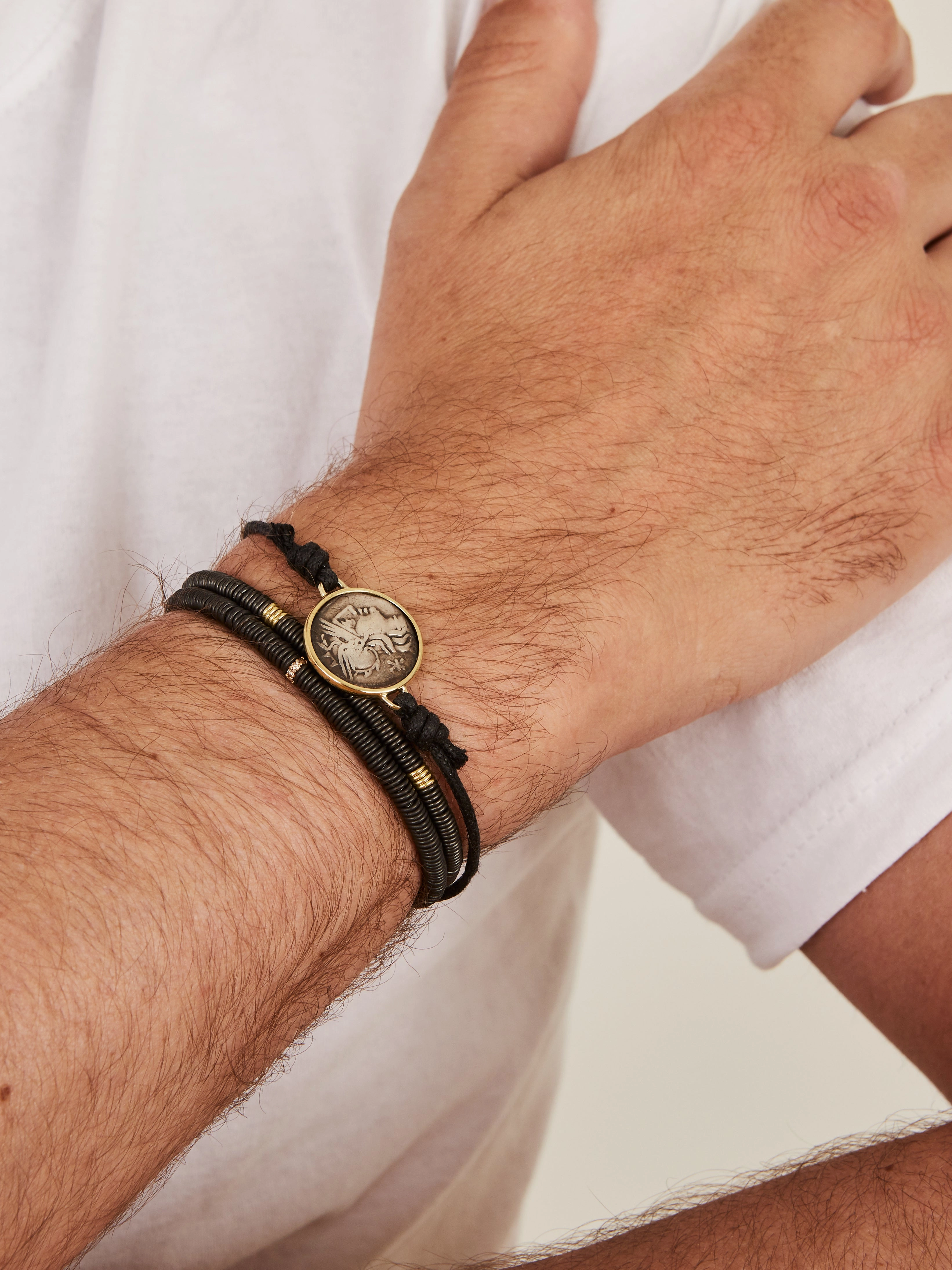 Yellow gold Roman coin bracelet